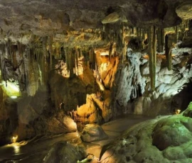 Day 3: Inside Lod Cave, one of northern Thailand's most spectacular limestone systems – ancient stalactites and stalagmites illuminate the dramatic chambers of Mae Hong Son. Illuminated stalactites and stalagmites inside Lod Cave dramatic limestone chamber Mae Hong Son northern Thailand